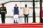 Narendra Modi news, Sri Lanka, narendra modi receives ceremonial guard of honour in sri lanka, Covid 19