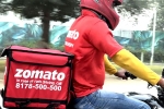 Zomato latest, Zomato net loss, zomato has half its net loss, Food delivery