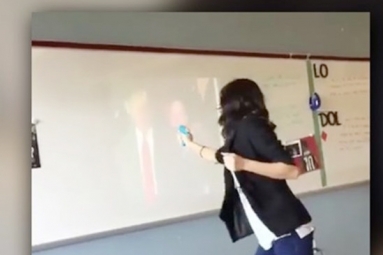 Indian-origin teacher suspended for shooting water at Trump’s Image Indian-origin teacher suspended for shooting water at Trump’s Image